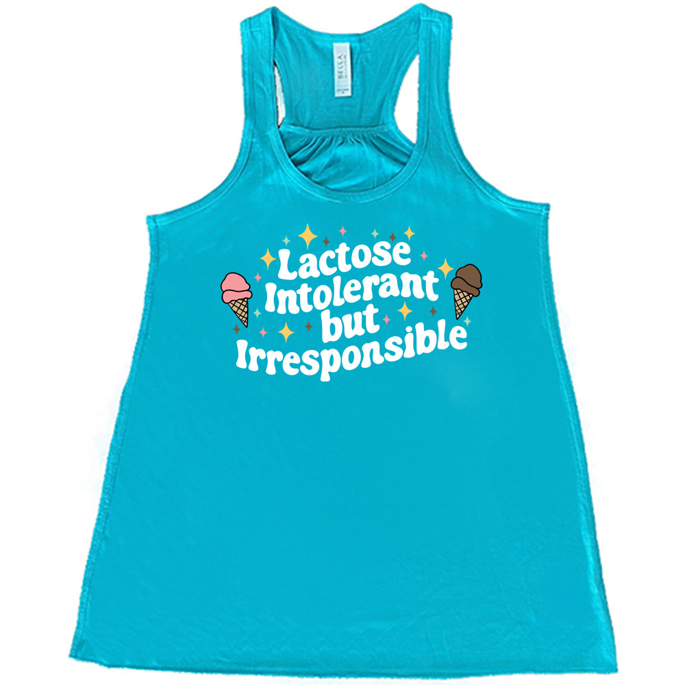 teal cropped tee with the text "Lactose Intolerant But Irresponsible" on it