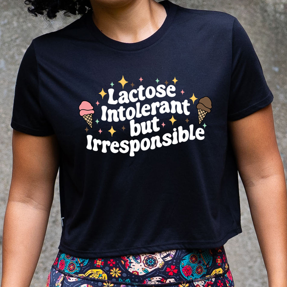 black cropped tee with the text "Lactose Intolerant But Irresponsible" on it