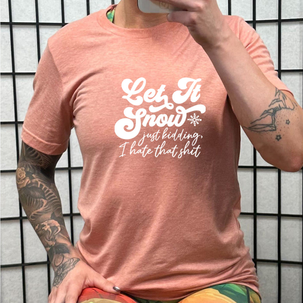 peach shirt with the text "Let It Snow, Just Kidding I Hate That Shit" on it