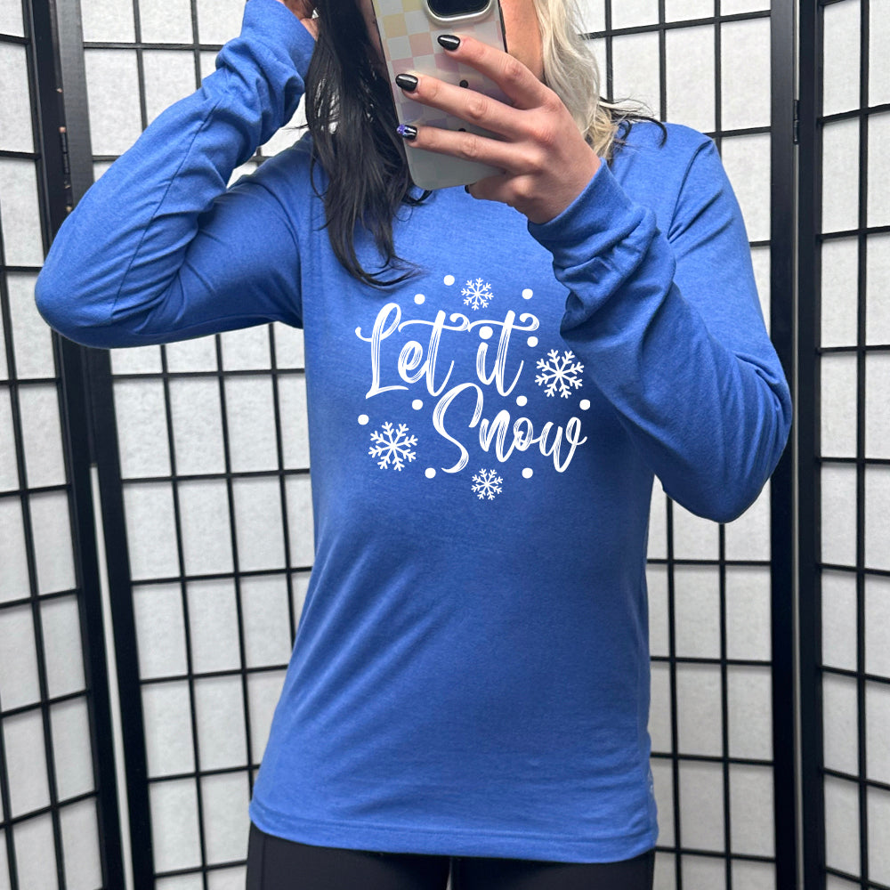 blue long sleeve shirt with the text "Let It Snow" on it