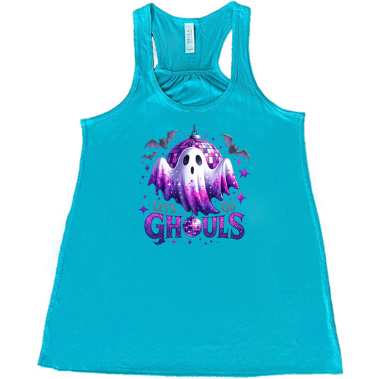 teal shirt that has a ghost graphic on it with the text "Let's Go Ghouls" on it