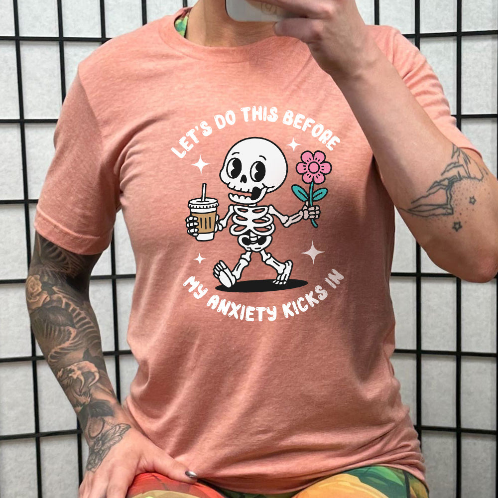 peach shirt with the text "Lets Do This Before My Anxiety Kicks In" on it