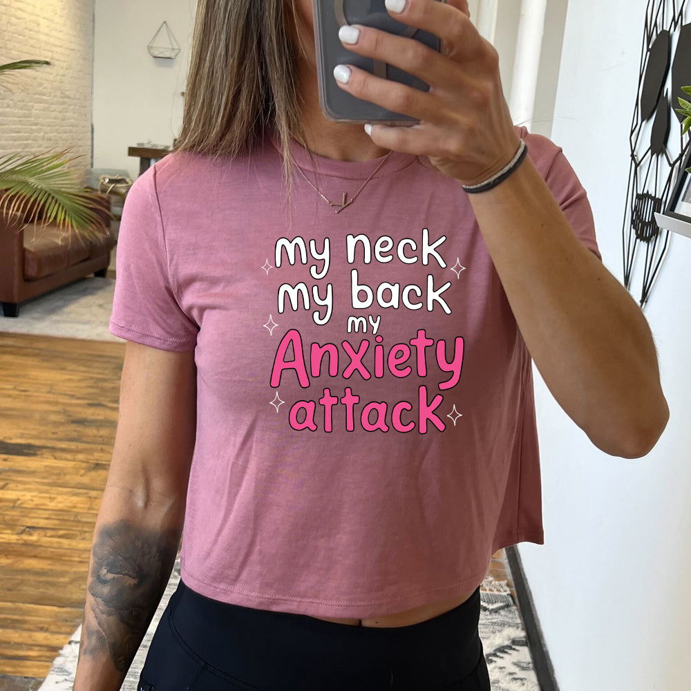 mauve cropped tee with the text "My Neck My Back My Anxiety Attack" on it