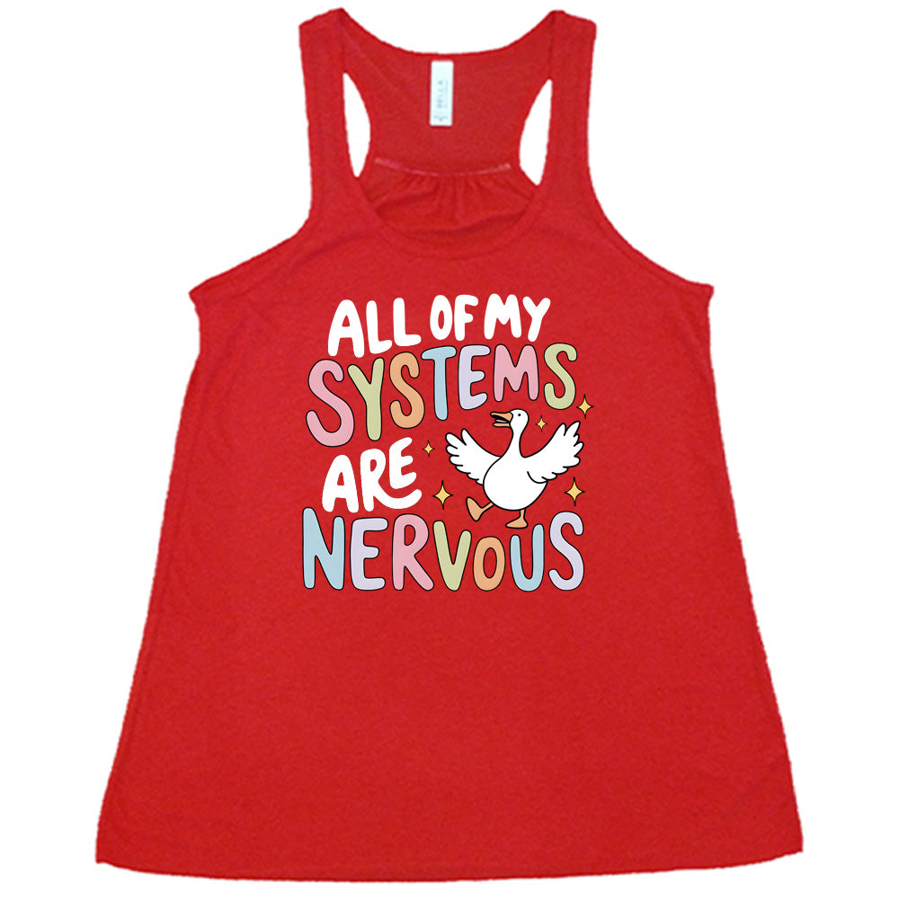 red shirt with the text "All Of My Systems Are Nervous" on it