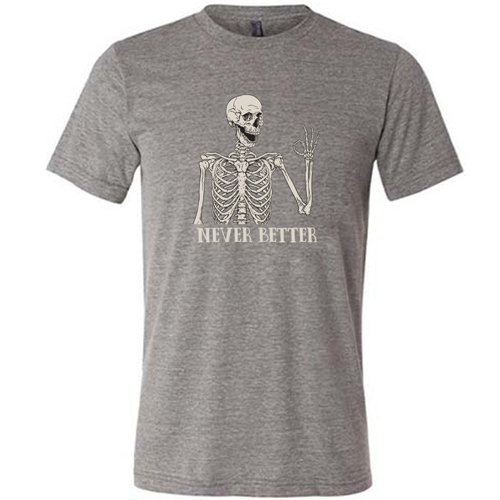 grey shirt with the text "Never Better" and a skeleton graphic on it