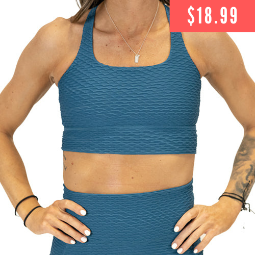 $18.99 solid teal textured print sports bra