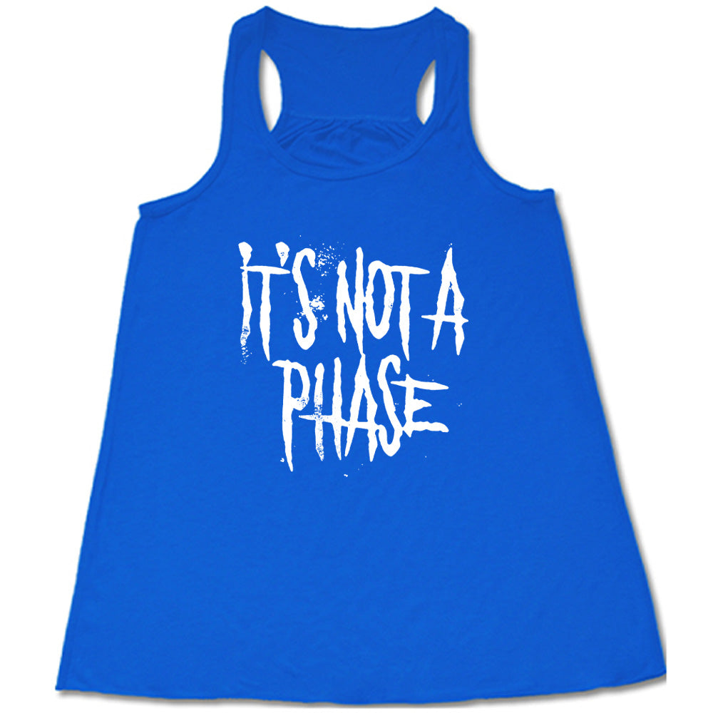 blue shirt with the text "It's Not A Phase" on it