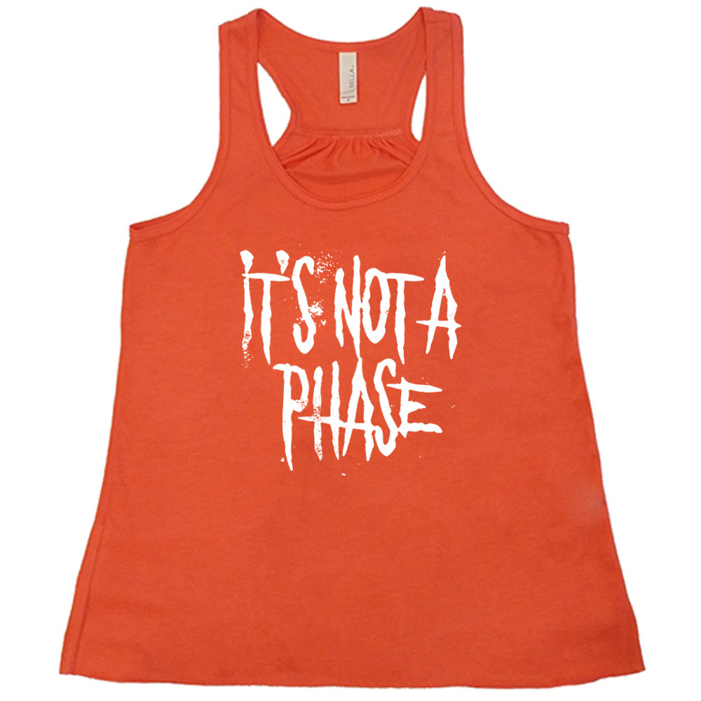 coral shirt with the text "It's Not A Phase" on it