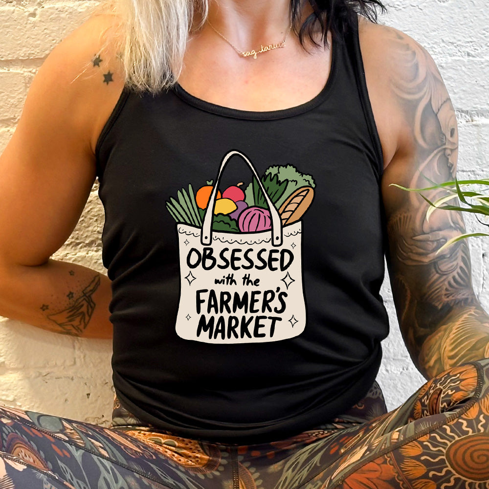 black shirt with the text "Obsessed With The Farmer's Market" on it