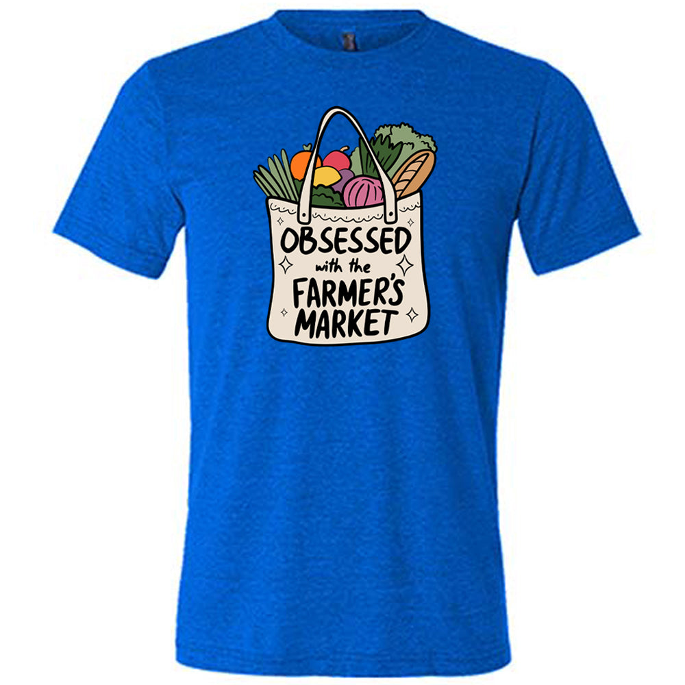 blue shirt with the text "Obsessed With The Farmer's Market" on it