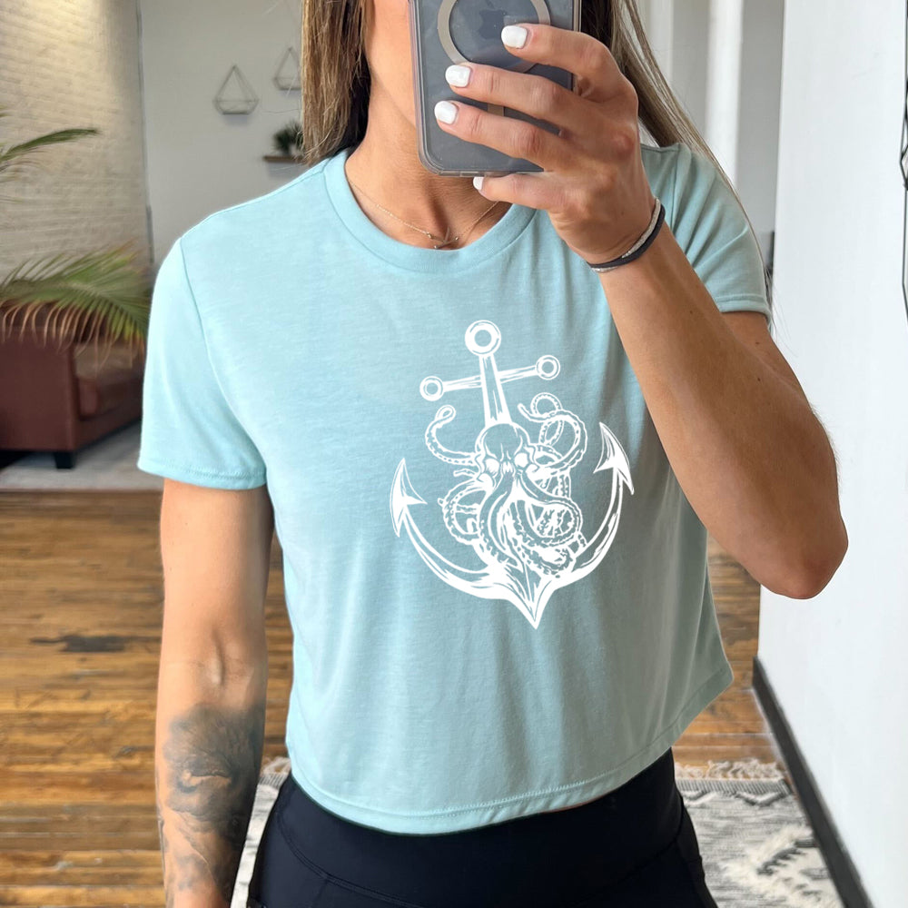 dusty blue cropped tee with an Octopus Anchor graphic on it