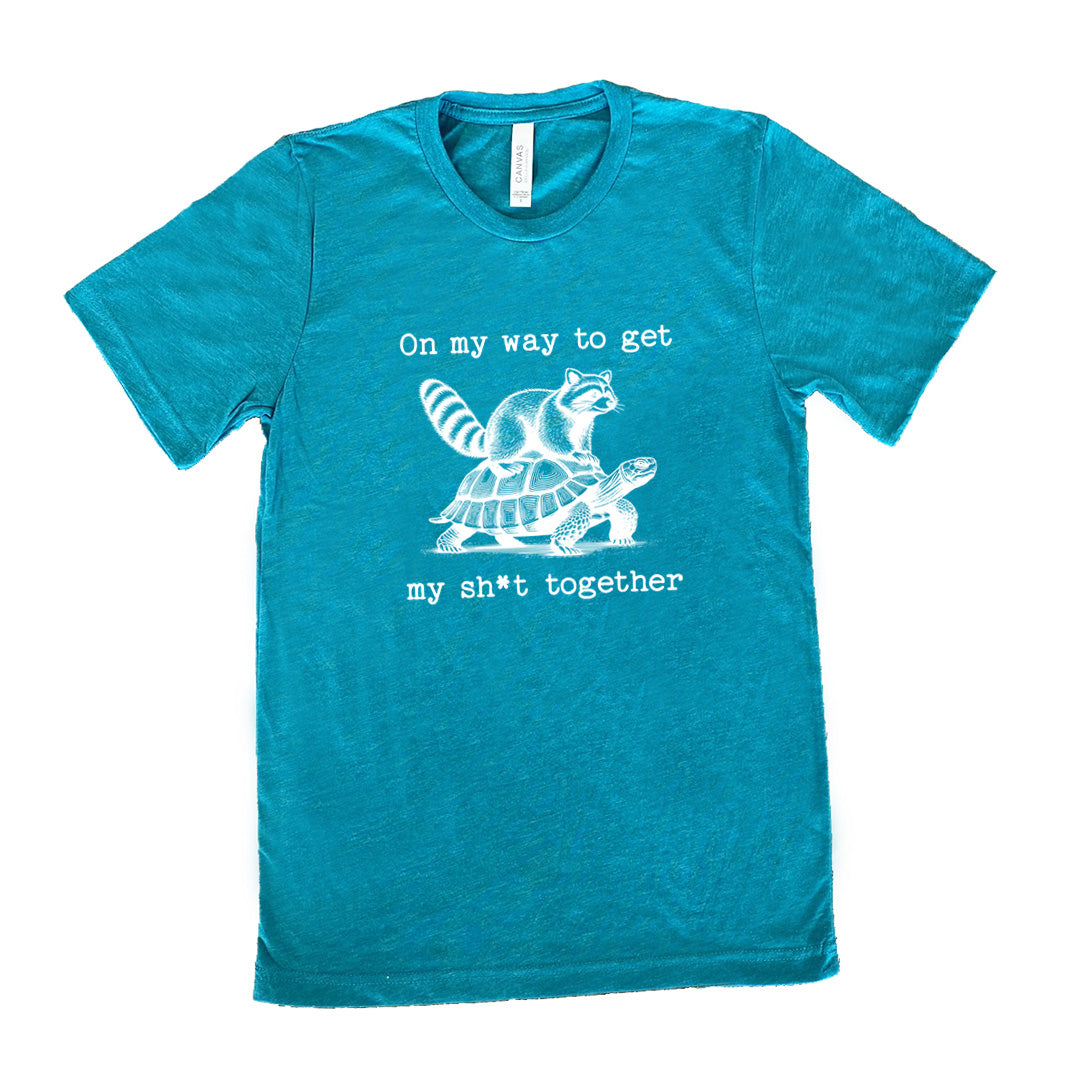 teal shirt with the text "On My Way To Get My Shit Together" on it