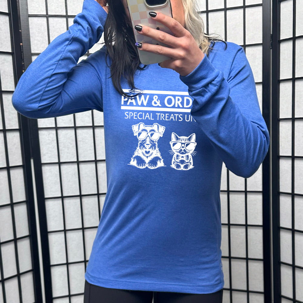 royal blue shirt with the text "Paw & Order" and a graphic of a cat and dog on it