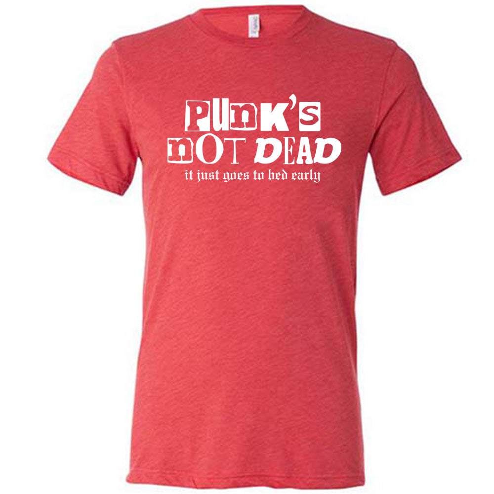 red shirt with the text "Punk's Not Dead, It Just Goes To Bed Early" on it