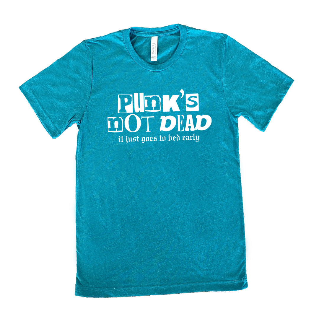 teal shirt with the text "Punk's Not Dead, It Just Goes To Bed Early" on it