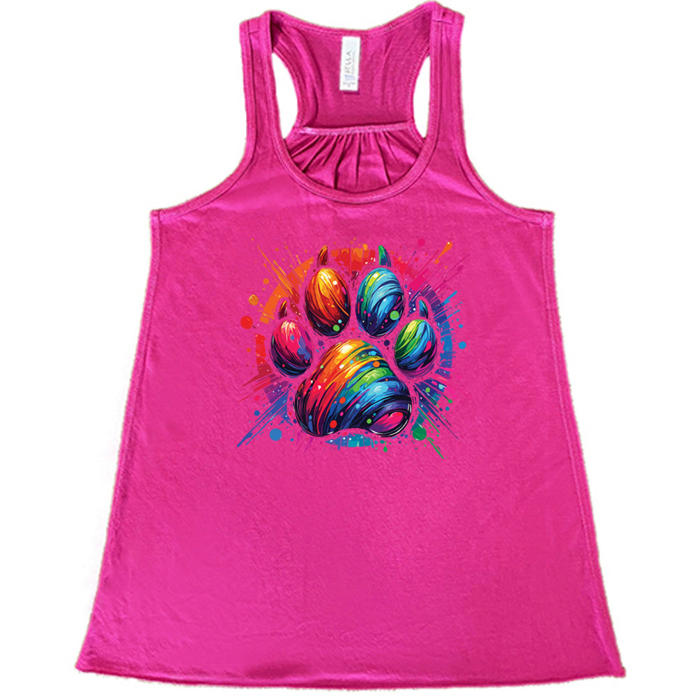 berry shirt with a rainbow paw print graphic on it