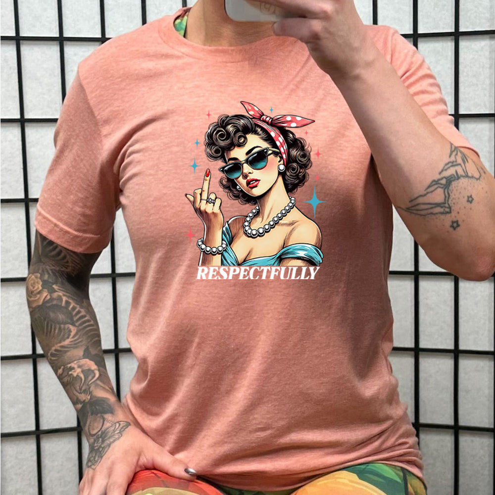 peach shirt with a graphic of a lady putting her middle finger up with the text "respectfully"