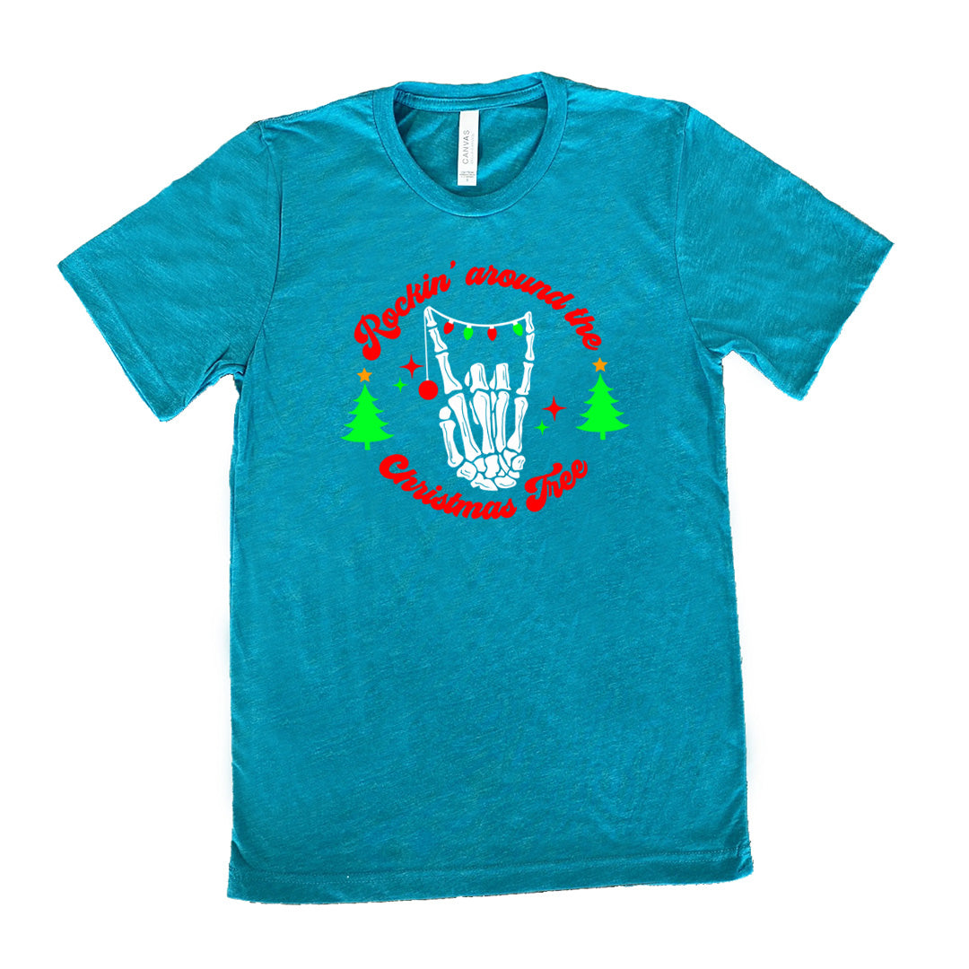 teal shirt with the text "Rockin' Around The Christmas Tree" on it