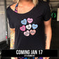 black slouchy shirt with cartoon valentine heart candy graphics on it coming soon