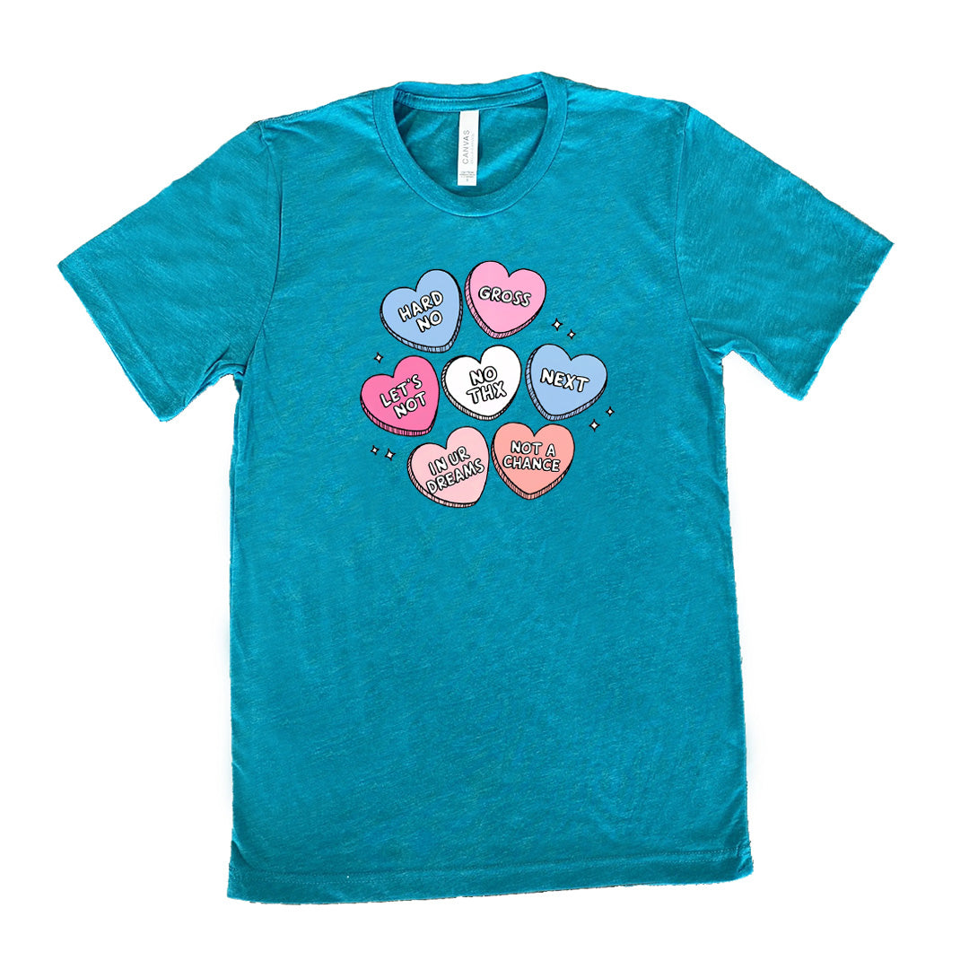 teal shirt with cartoon valentine heart candy graphics on it