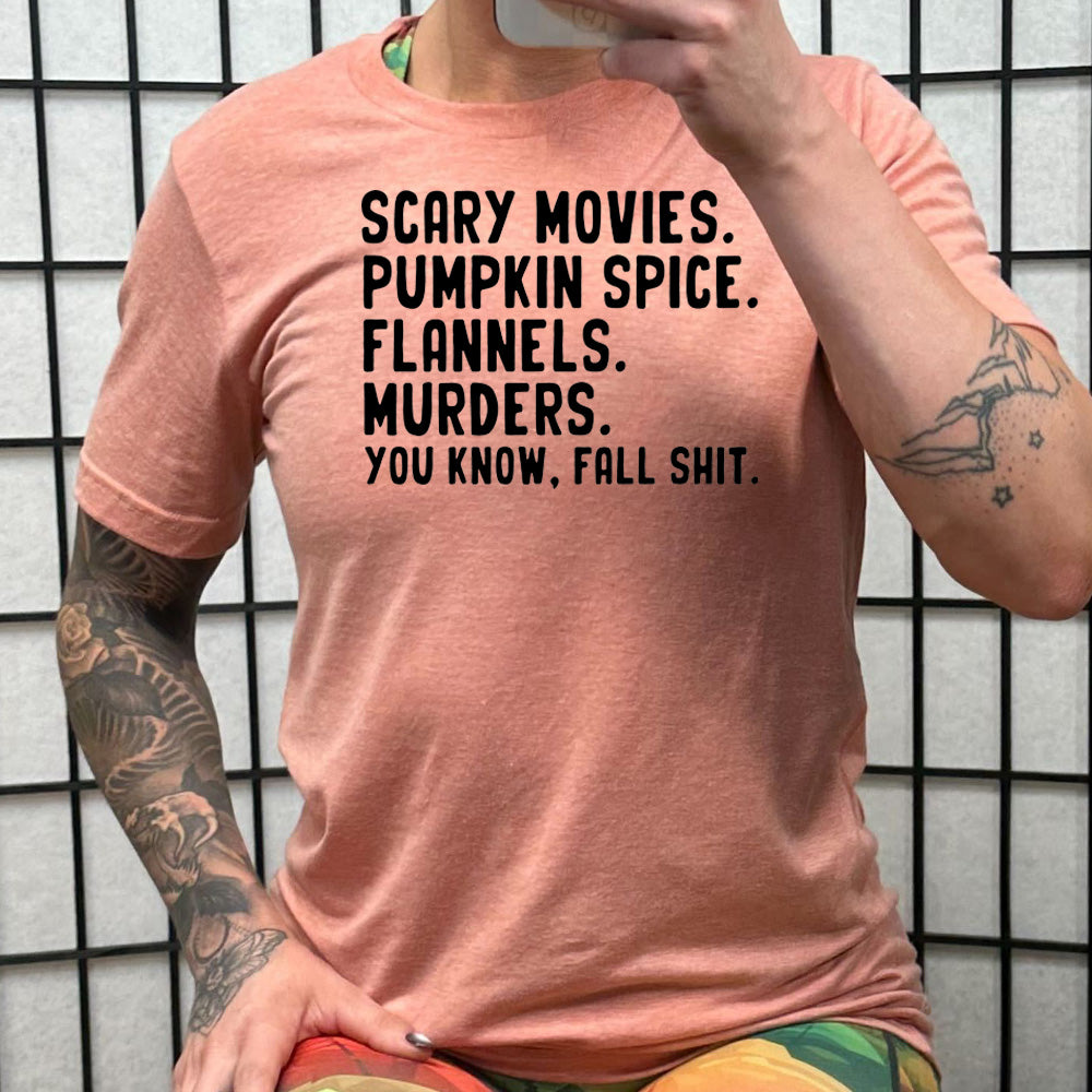 peach shirt with the text "Scary Movies. Pumpkin Spice. Flannels. Murders. You Know Fall Shit"