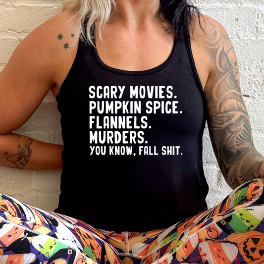 black shirt with the text "Scary Movies. Pumpkin Spice. Flannels. Murders. You Know Fall Shit"