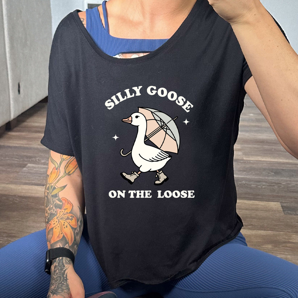 black slouchy shirt with the text "Silly Goose On The Loose" on it