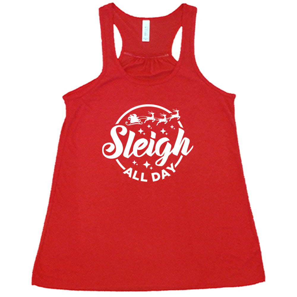 red shirt with the text "Sleigh All Day" on it