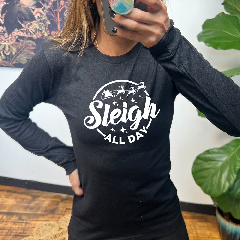 black long sleeve shirt with the text "Sleigh All Day" on it