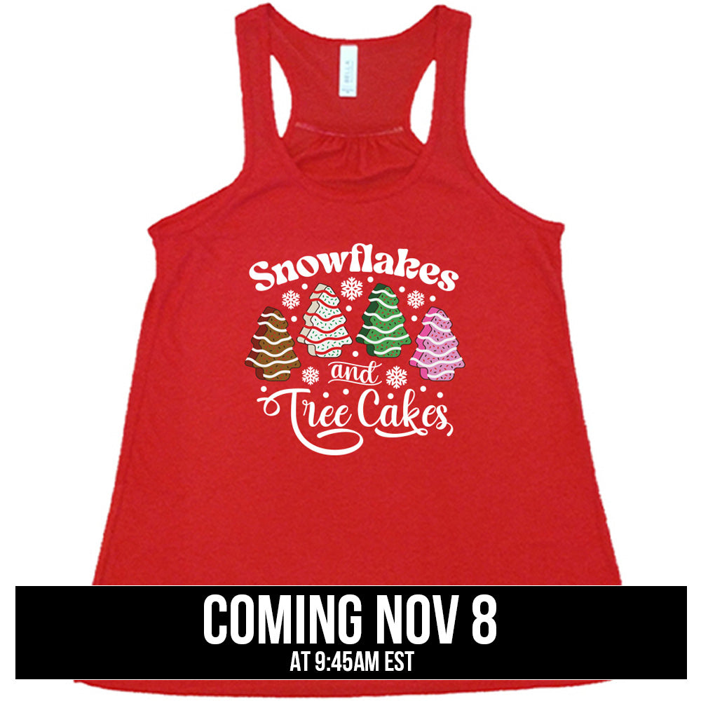 shirt with Snowflakes & Tree Cakes graphics on it coming soon