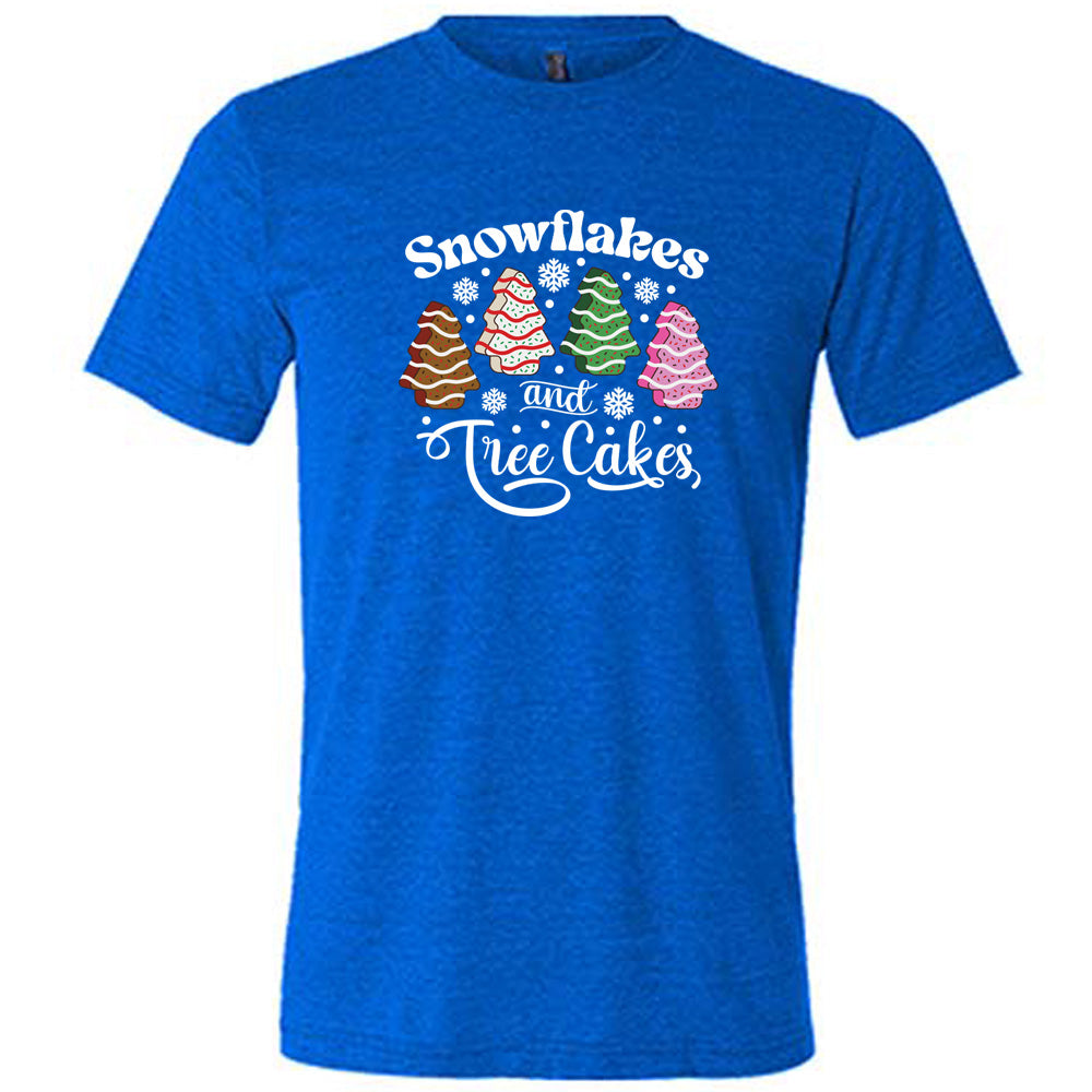 blue shirt with Snowflakes & Tree Cakes graphics on it