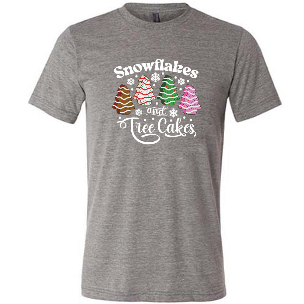 grey shirt with Snowflakes & Tree Cakes graphics on it