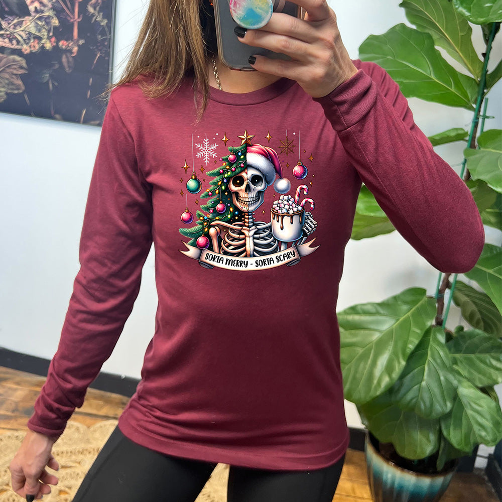 maroon long sleeve shirt with the text "Sorta Merry Sorta Scary" on it