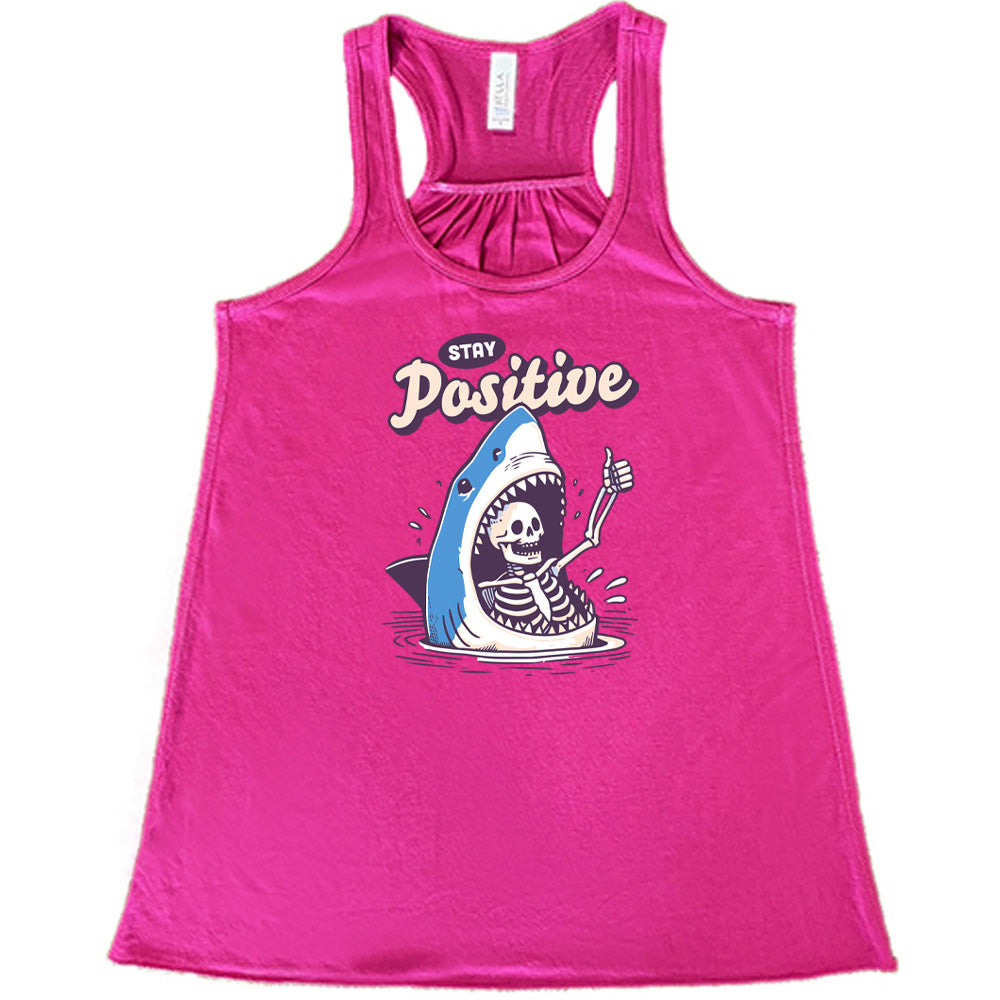 berry shirt with the text "Stay Positive" on it