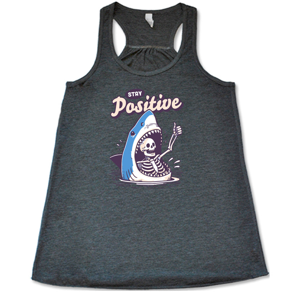 grey shirt with the text "Stay Positive" on it