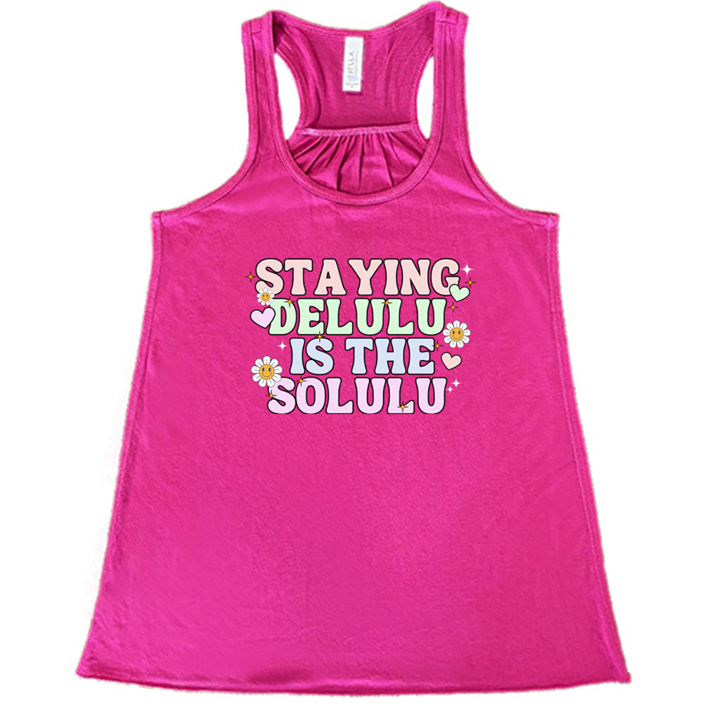 berry shirt with the text "Staying Delulu Is The Solulu" on it