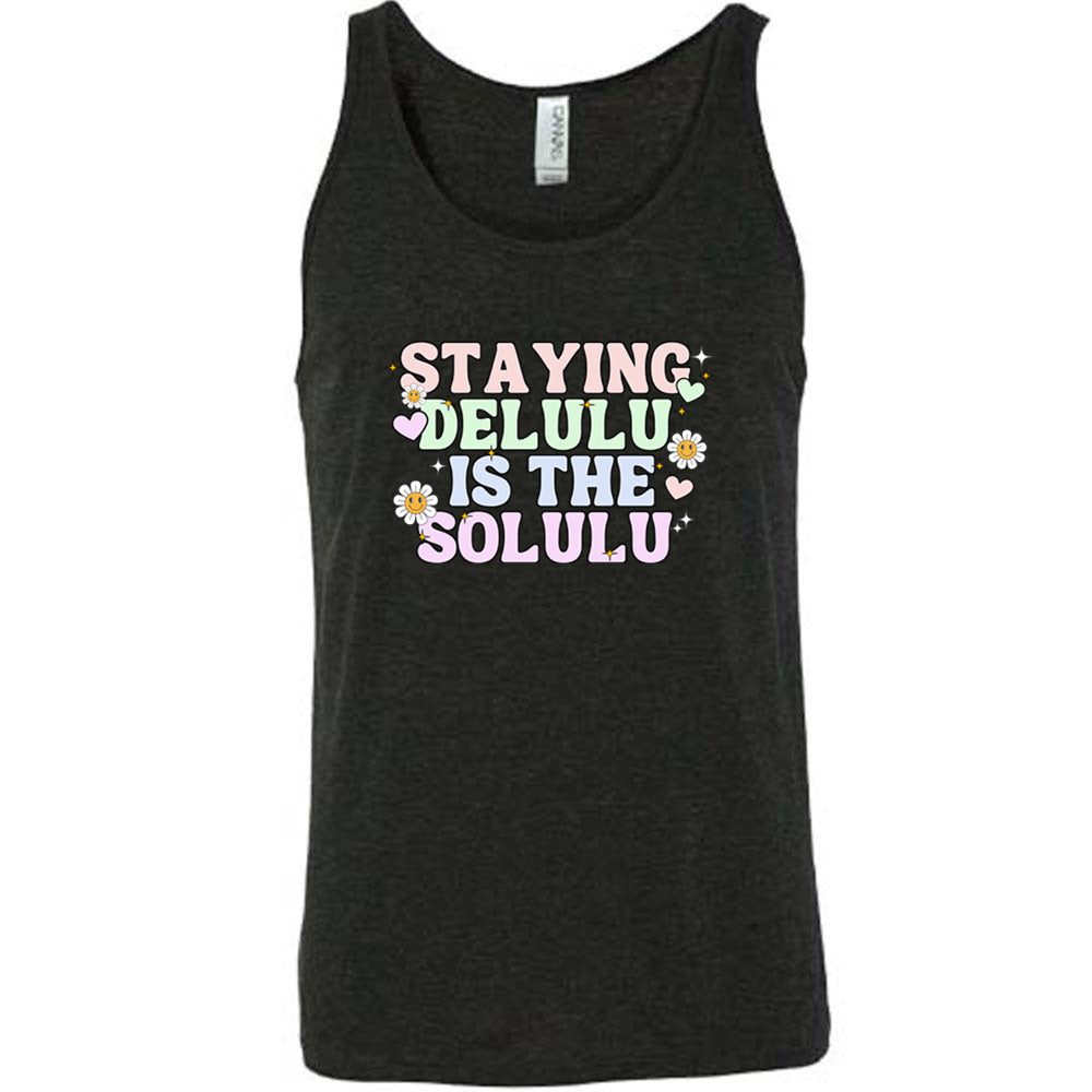 black shirt with the text "Staying Delulu Is The Solulu" on it