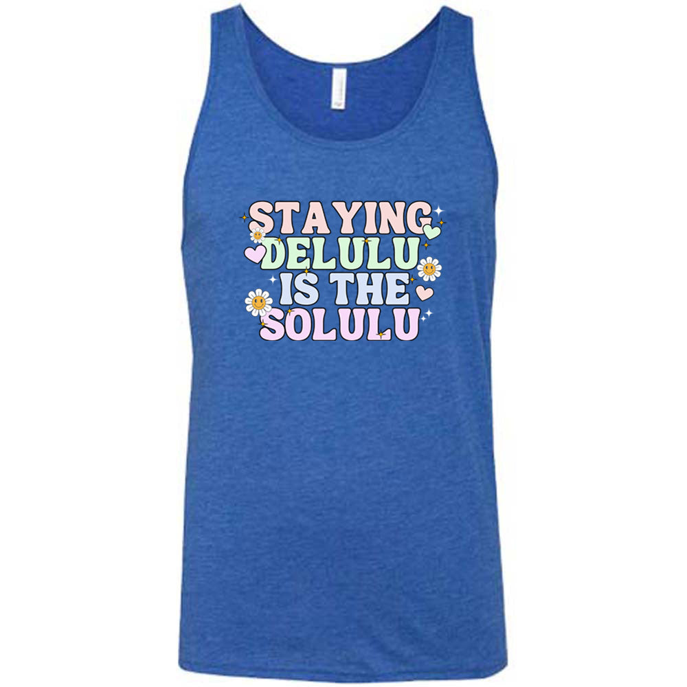 blue shirt with the text "Staying Delulu Is The Solulu" on it