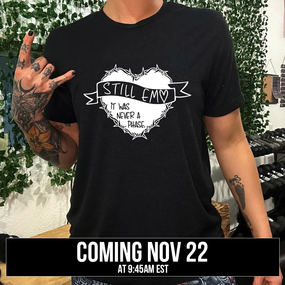 shirt with the text "Still Emo It Was Never A Phase" on it coming soon