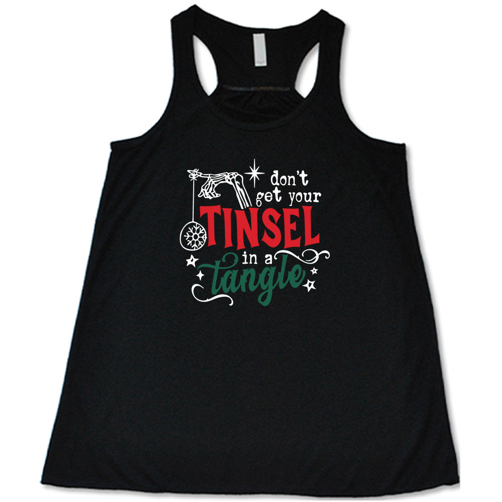 black shirt with the text "Don't Get Your Tinsel In A Tangle" on it