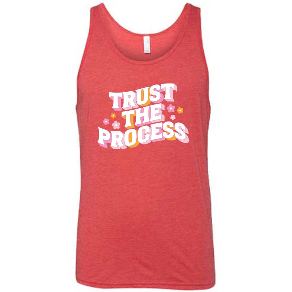 red shirt with the text "Trust The Process" on it