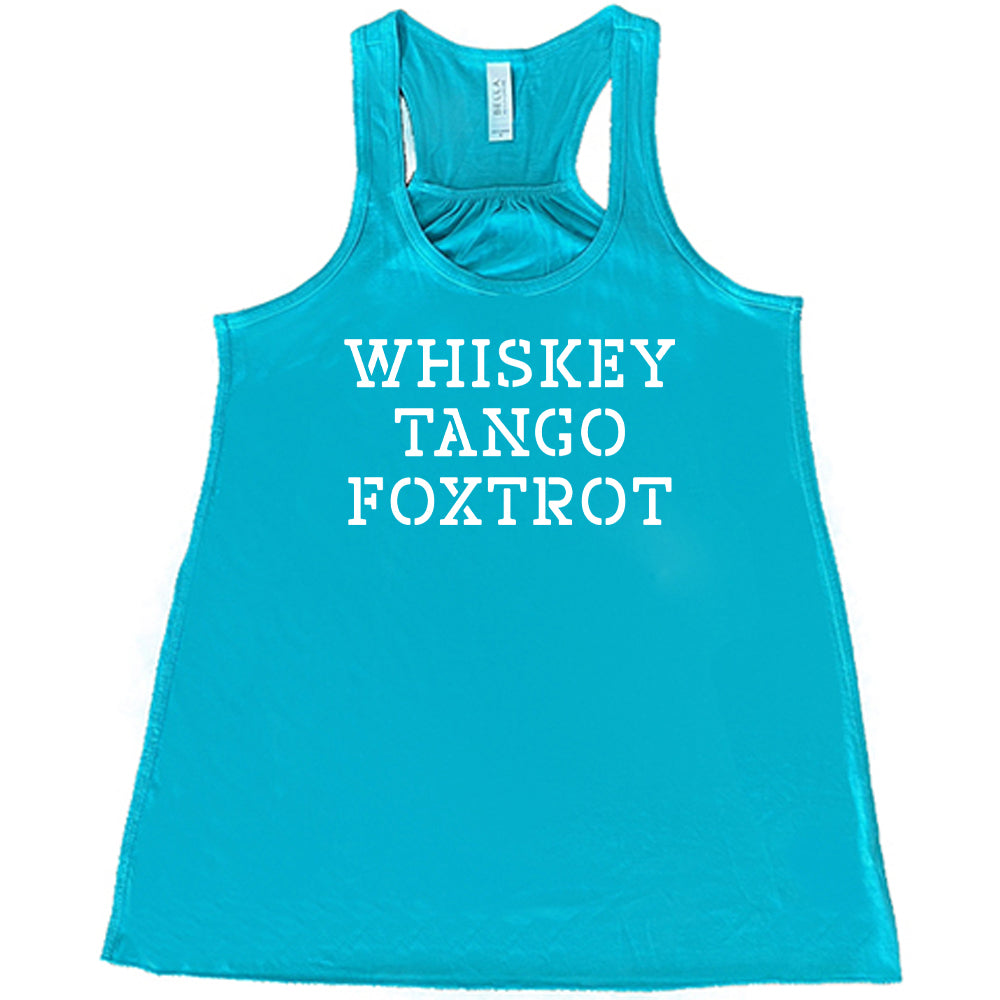 teal shirt with the quote "Whiskey Tango Foxtrot" on it