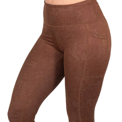 brown leggings with animal outlines on them