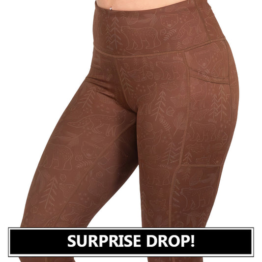 brown leggings with animal outlines on them surprise drop