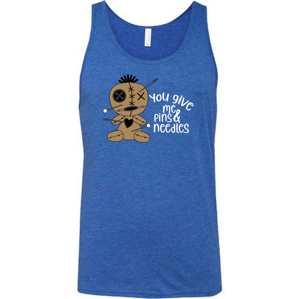 blue shirt with a voodoo doll graphic and the quote "You Give Me Pins And Needles" on it