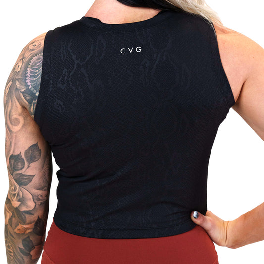 the back of the black snakeskin print crop top