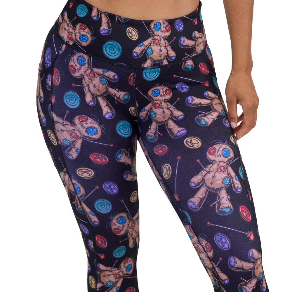 black voodoo doll patterned leggings