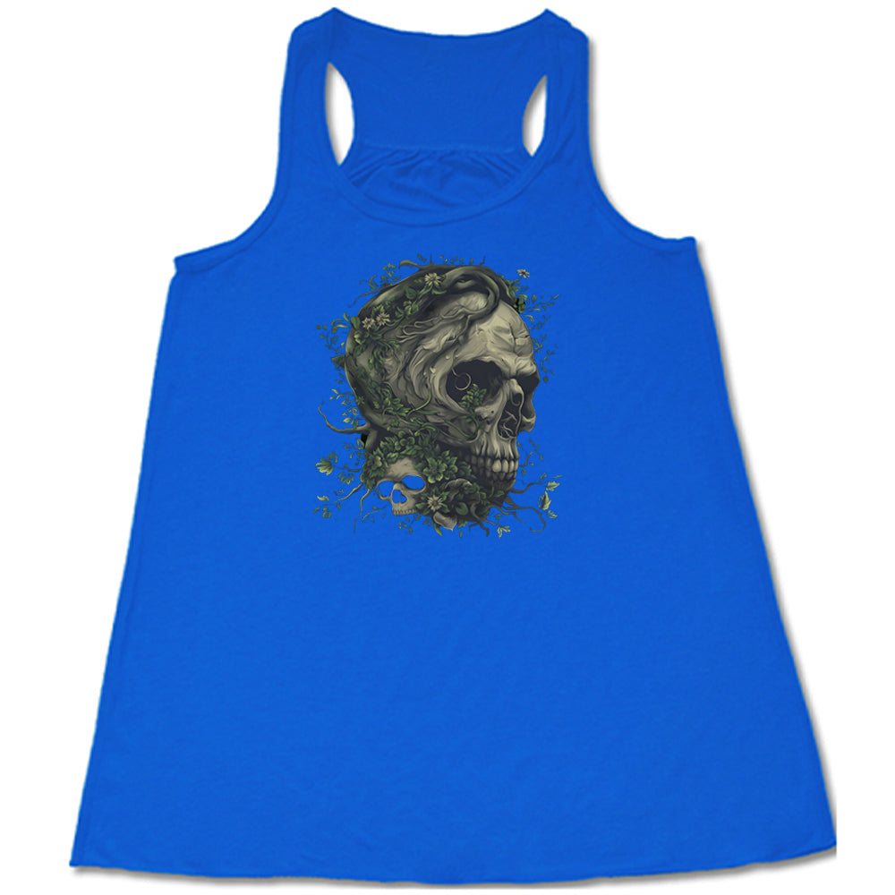 blue shirt with a tree skull graphic in the middle