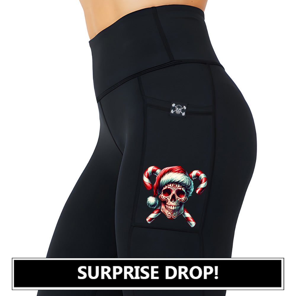 black leggings with a candy cane skull graphic on it surprise drop