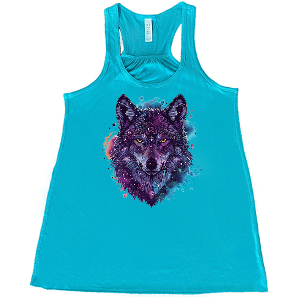 teal shirt with a colorful wolf graphic on it